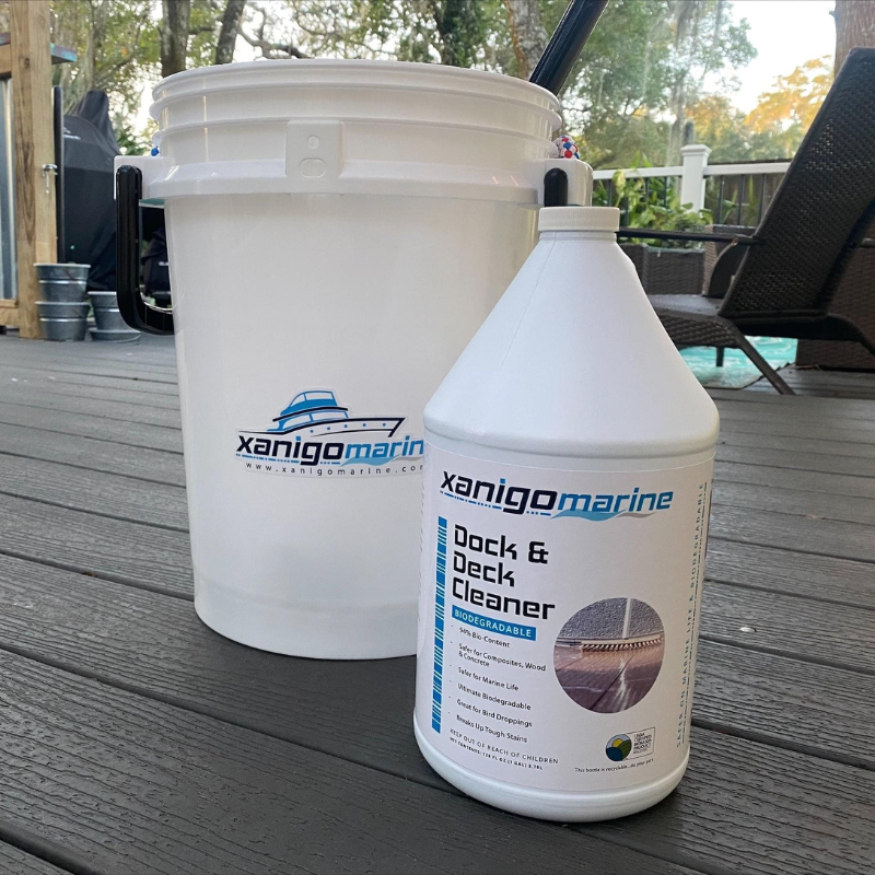 Xanigo Marine Dock & Deck Cleaner, placed next to a Xanigo Marine branded bucket.