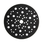 Close-up of a Mirka sanding disc with multiple perforations, designed for effective dust extraction during sanding tasks.