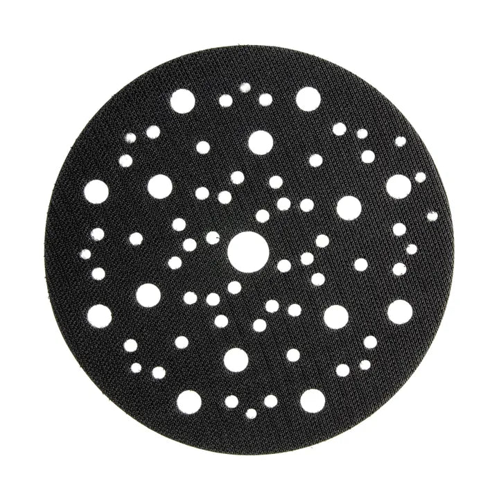 Close-up of a Mirka sanding disc with multiple perforations, designed for effective dust extraction during sanding tasks.