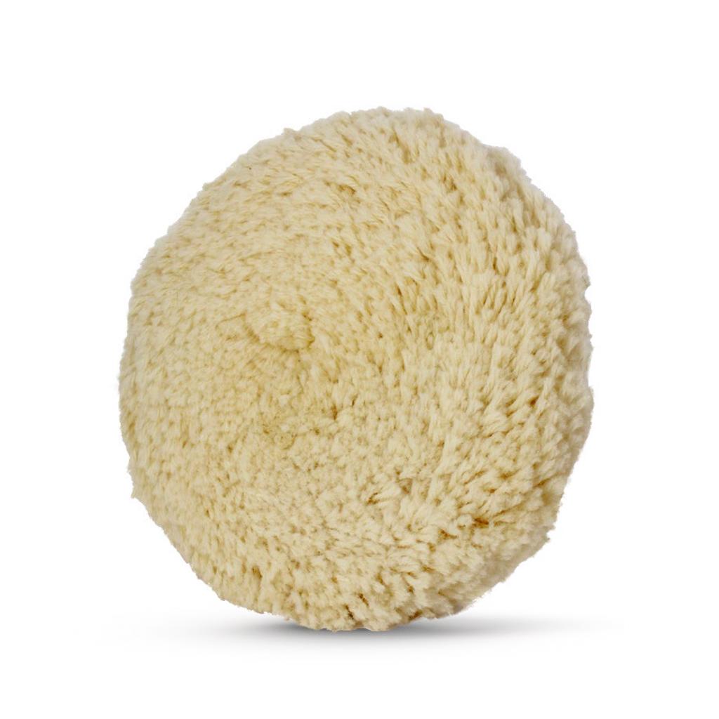 Soft, fluffy cream-colored wool polishing pad designed for finishing and buffing surfaces.