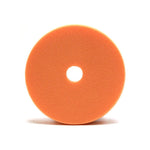Orange foam polishing pad with a central hole, typically used for automotive or marine surface finishing.