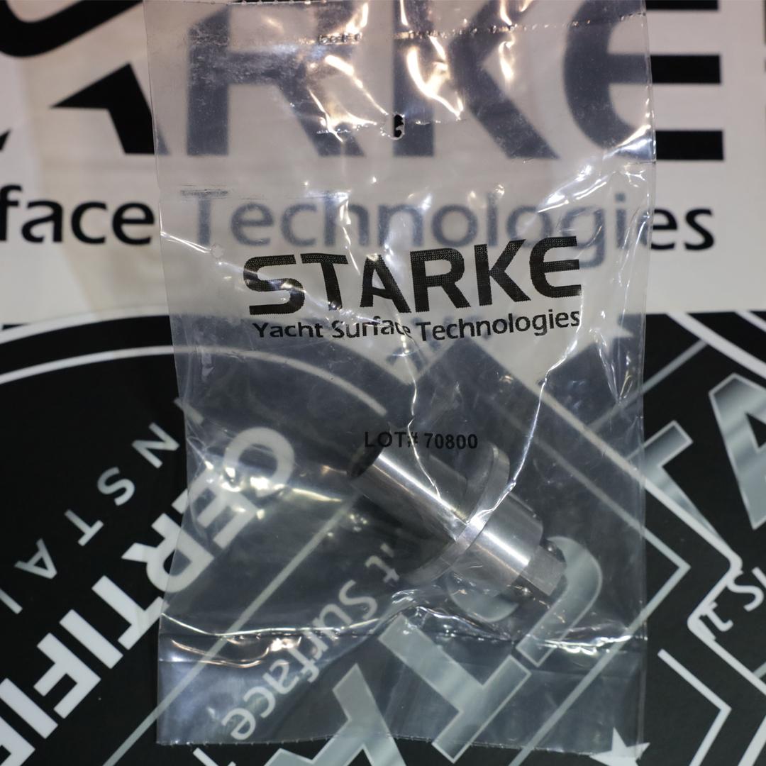 A Starke Quick Connect Pad Adaptor packaged in a clear plastic bag with the Starke Yacht Surface Technologies logo visible on the packaging.
