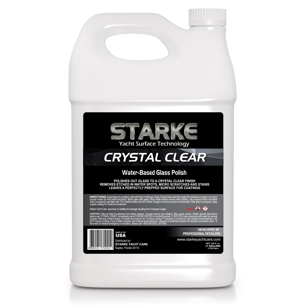 A 128oz bottle of Starke Crystal Clear Water-Based Glass Polish designed to buff out glass to a crystal-clear finish, removing water spots and micro-scratches while prepping the surface for coatings.
