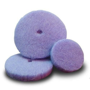 Two purple wool polishing pads with black backing, designed for use in polishing and cutting tasks, featuring soft, dense fibers for effective abrasion and finishing.