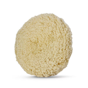 oft, fluffy cream-colored wool polishing pad designed for finishing and buffing surfaces.