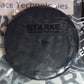 A Starke Double Sided Quick-Connect Black Foam Finishing Pad with a hexagonal hole in the center, designed for use with polishing machines.
